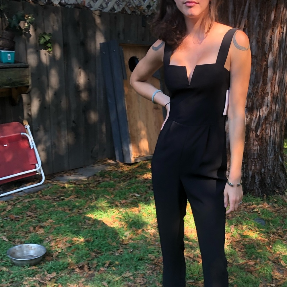 Amanda Uprichard. Elegant black romper.